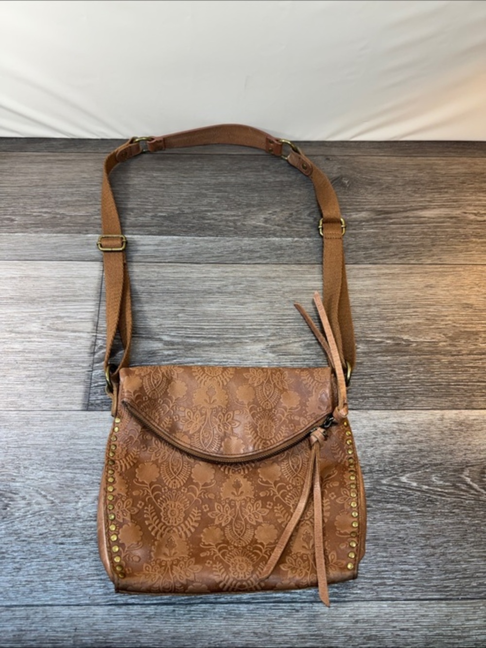 The Sak Tan Embossed Leather Crossbody with Stud Trim